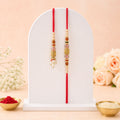 Antique Filigree Cube Charm Bhai Bhabhi Rakhi with Crystal Beads and Pearl Drops