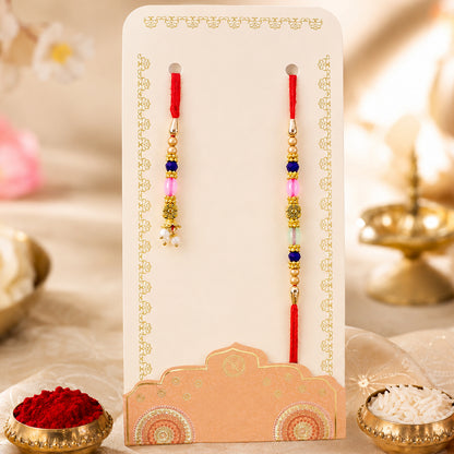 Graceful Floral Cluster Bhai Bhabhi Rakhi with Flower and Pearl Drop for Gifting