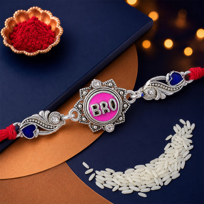 Silver-Toned BRO Rakhi with Pink Enamel, Blue Heart Accents, Crystals & Red Thread