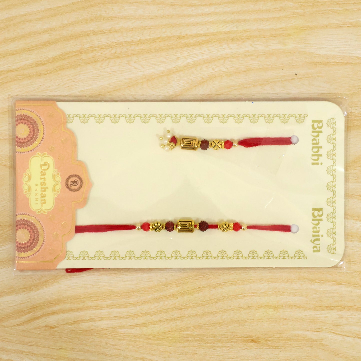 Geometric Rectangle Bhai Bhabhi Rakhi with Rectangular Charm and Tassel for Gifting