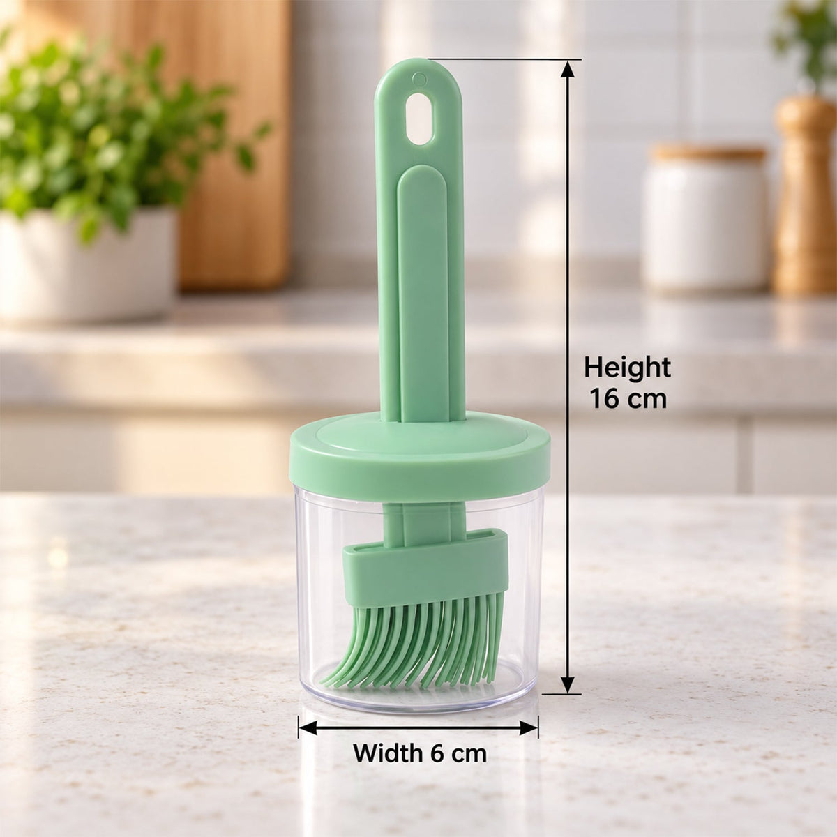 The light green silicone basting brush is stored inside its clear container with a matching green lid, showing height and