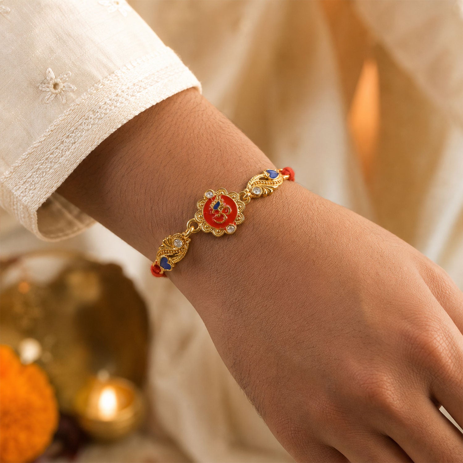 Premium Rakhi featuring Om Plaque, gold trims and chain look for Festive Display