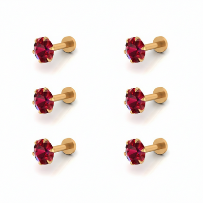 Set of six red ruby nosepin studs with gold prong setting and flat backs