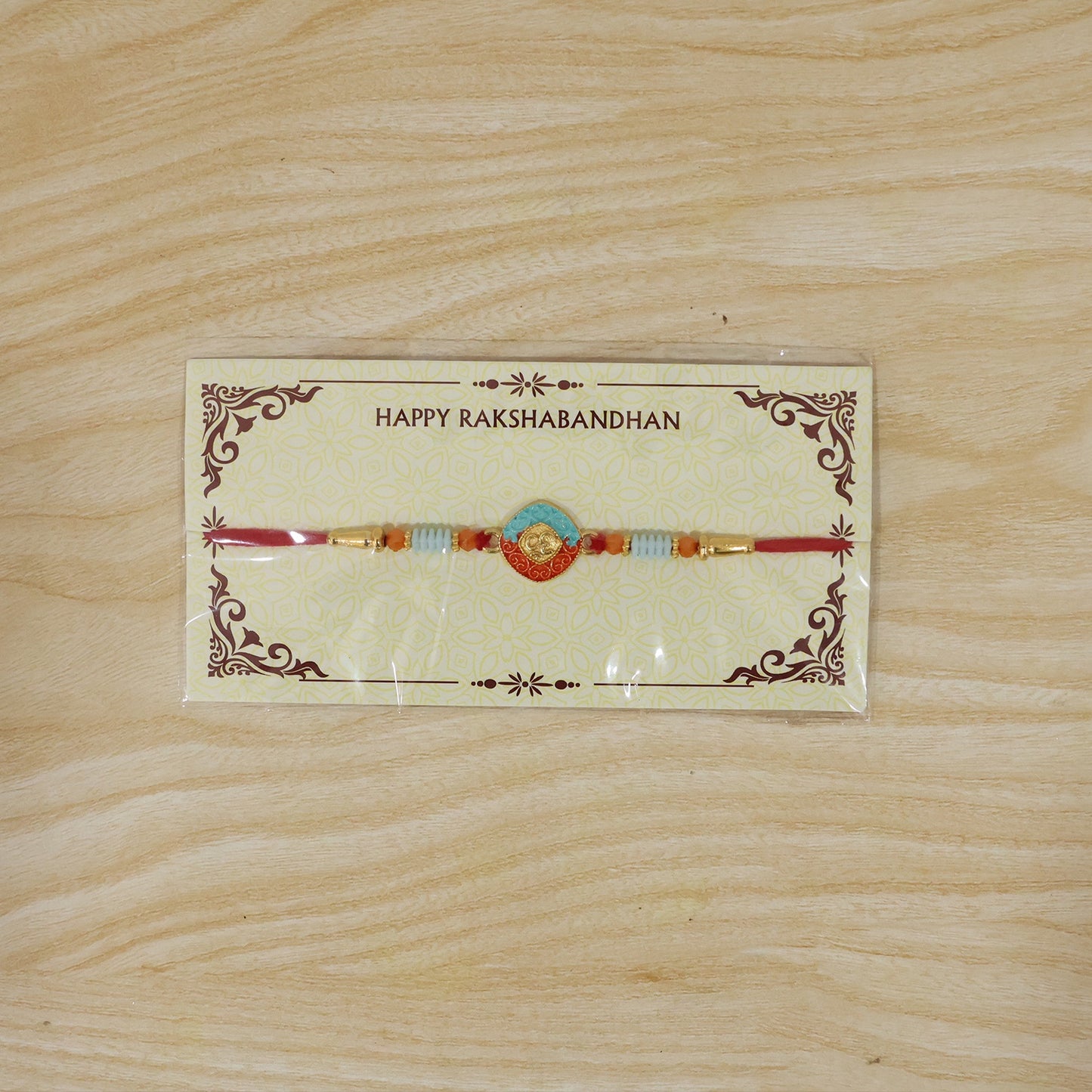OM Symbol Rakhi showcasing festive charm