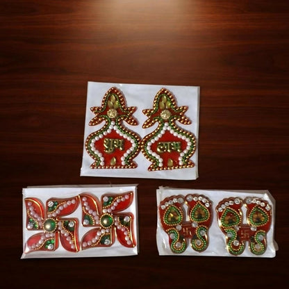 Three individually packaged sets of Shubh Labh, Swastik, and Laxmi Charan Paduka stickers on a dark wooden surface.