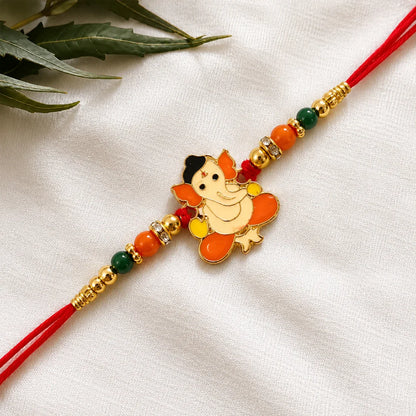 Overhead view of the Bal Ganesha Rakhi's design and bead arrangement.
