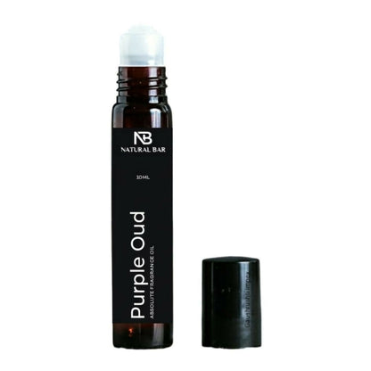 Luxury purple oud attar roll-on with smooth rollerball applicator
