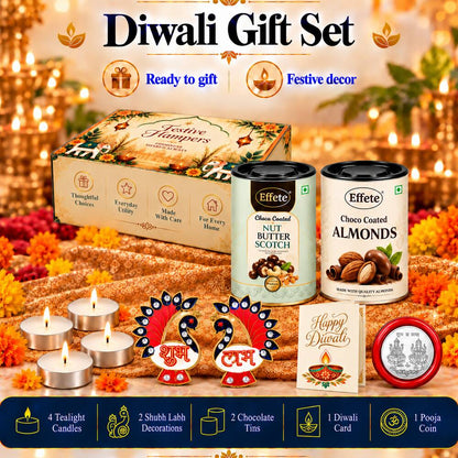 A Diwali gift set with a decorative box, two tins of chocolate-coated nuts, four tealight candles, two peacock Shubh Labh