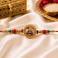Khatu Shyam Ji Pendant Rakhi with Red and Green Beads