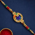Classic Rakhi with Peacock Circle Charm, leaf touch and thread look for Gift Use