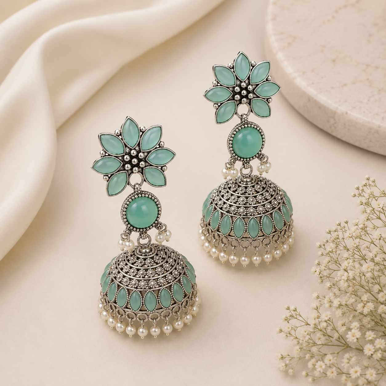 Elegant Oxidized Silver Jhumka Earrings with Sky Blue Stones & Pearl Accents