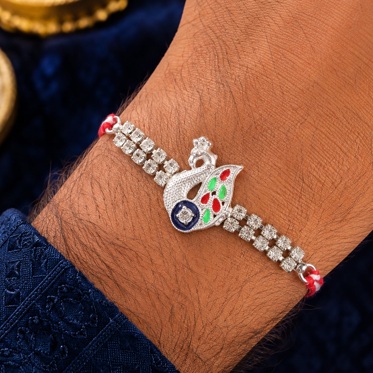 Silver-Toned Peacock Rakhi with Multicolor Enamel, Double Crystal Chain & Red Thread