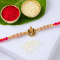 Designer Rakhi – Silver Tone with Pastel Beads Bracelet Style
