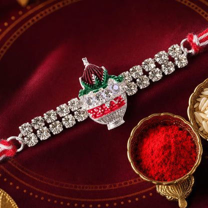 Festive Rakhi showcasing Kalash Charm, leaf detail and wrist style for Festive Use