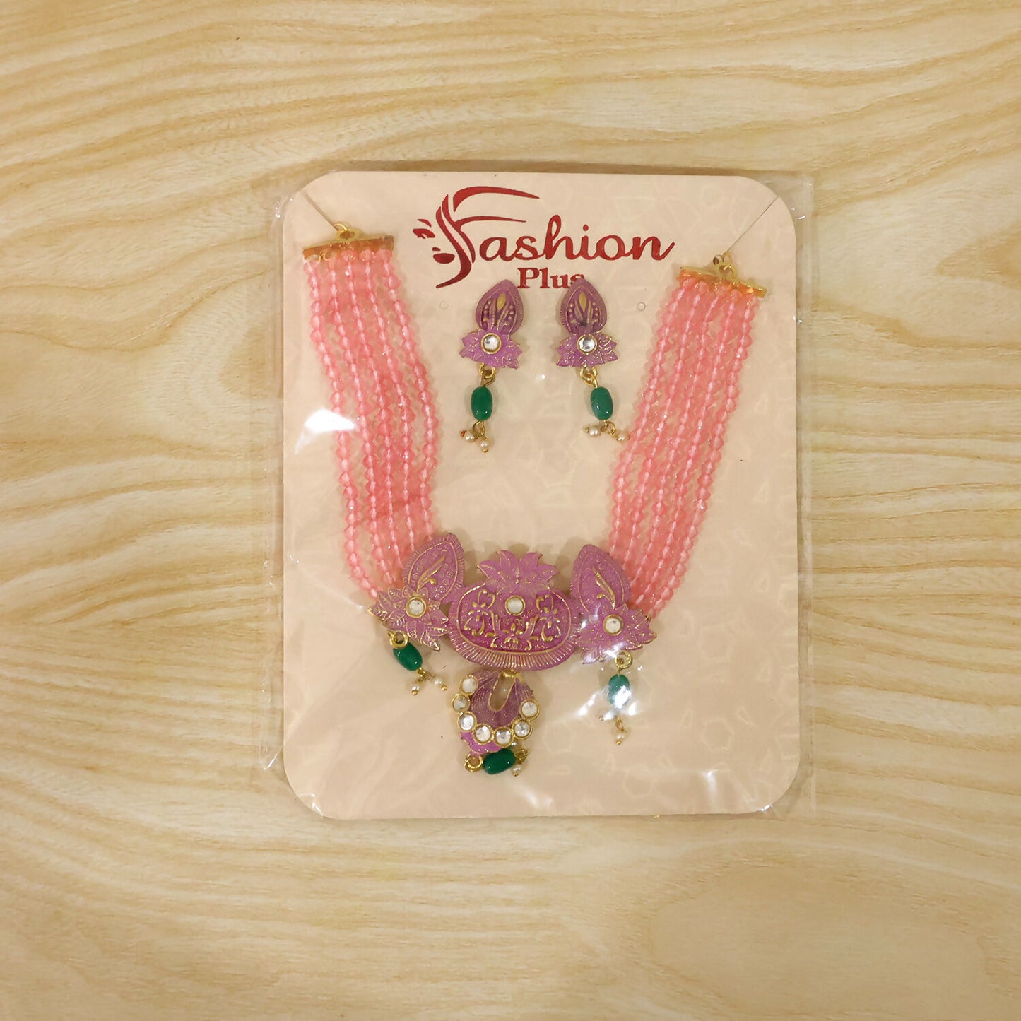 Pink beaded necklace set worn with ethnic attire