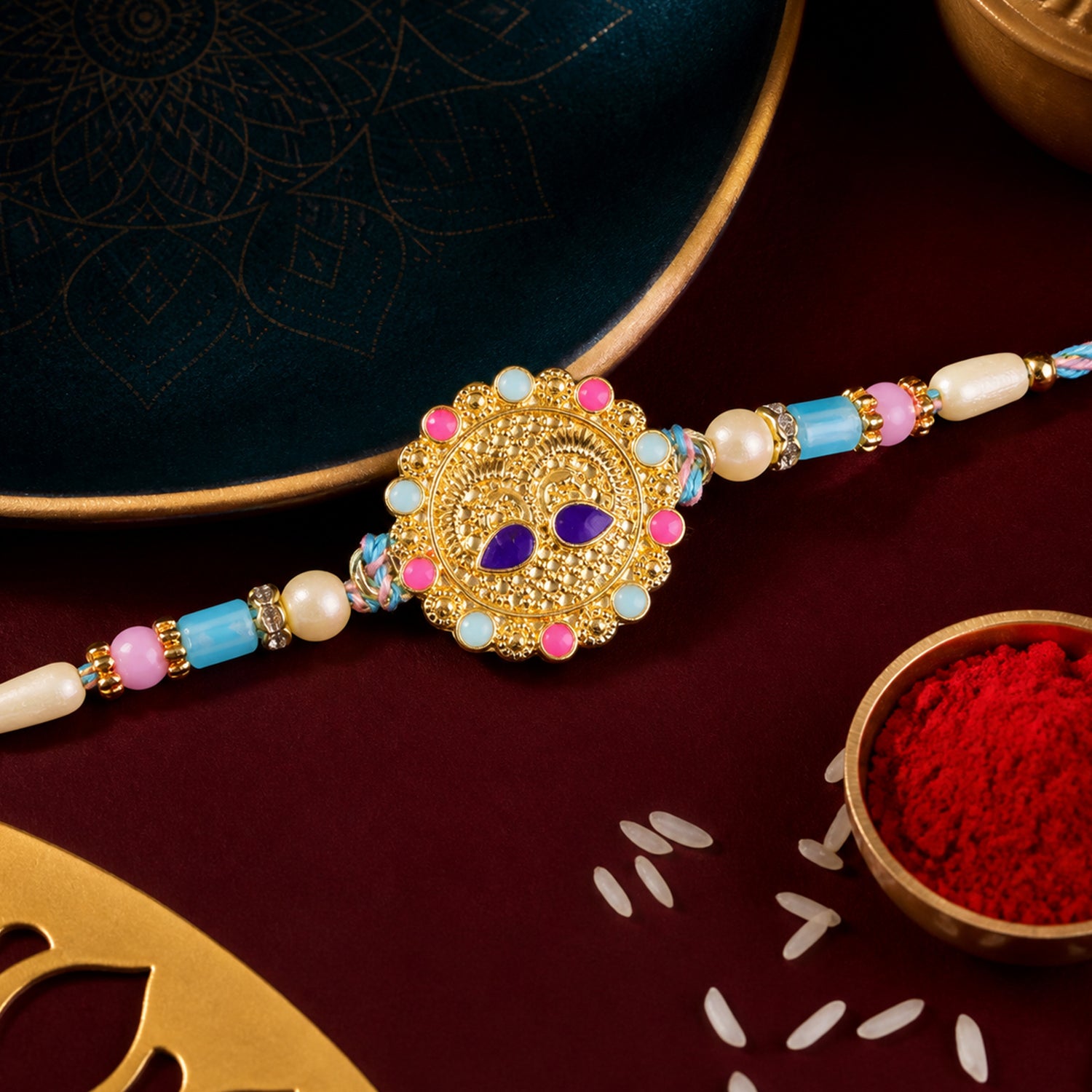 Gold Sunburst Kundan Pendant Rakhi with Pastel Beads