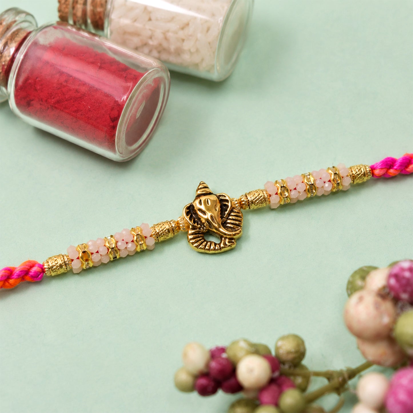 Silver Tone Designer Rakhi with Pastel Beads and Elegant Bracelet Style Finish