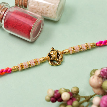 Silver Tone Designer Rakhi with Pastel Beads and Elegant Bracelet Style Finish