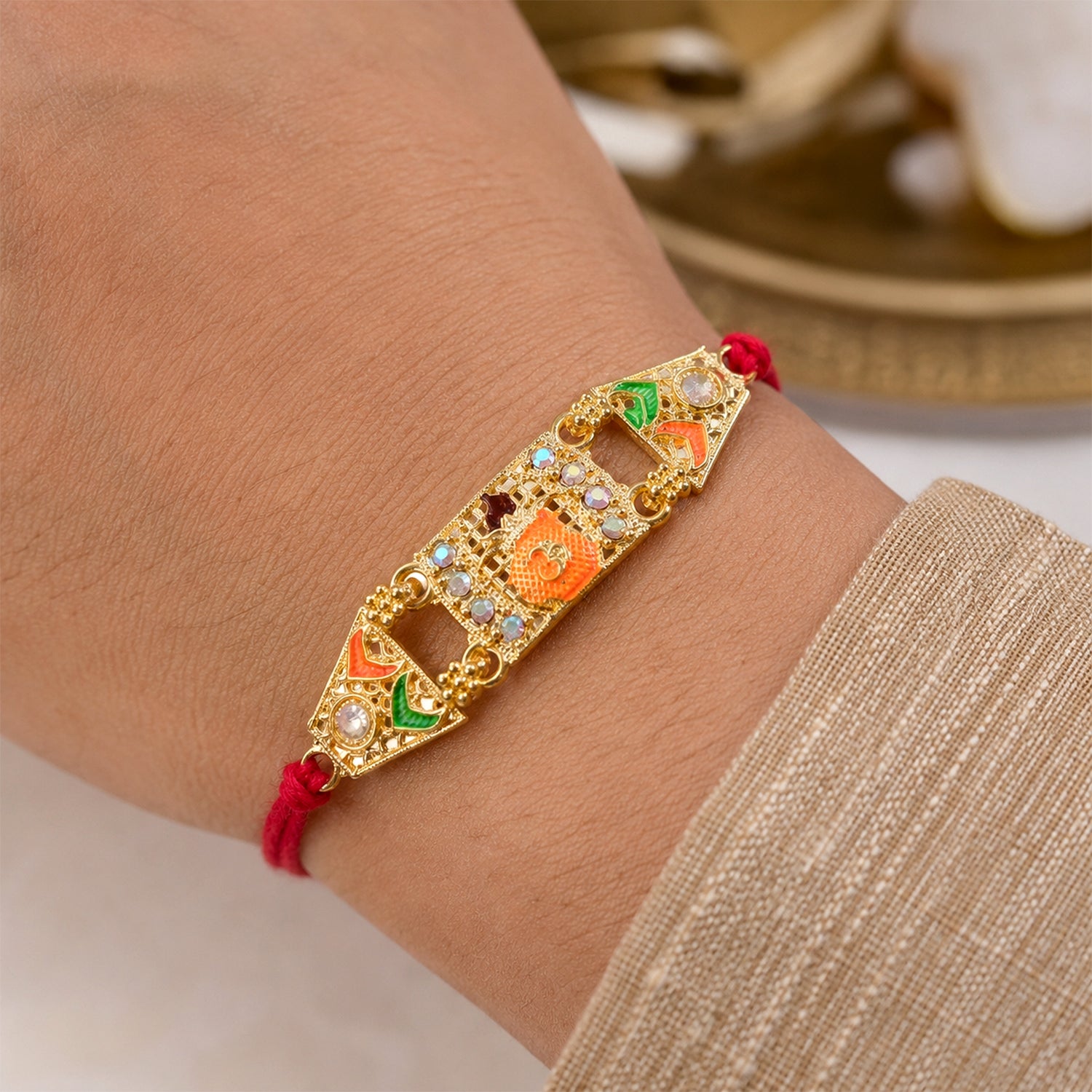 Premium Rakhi with Ornate Rectangular Plaque, crystal borders and chain look for Gift
