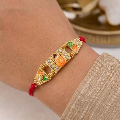 Premium Rakhi with Ornate Rectangular Plaque, crystal borders and chain look for Gift