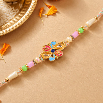 Ornate Rakhi featuring Petal Blossom Charm and bead line in gift style for Gift Use
