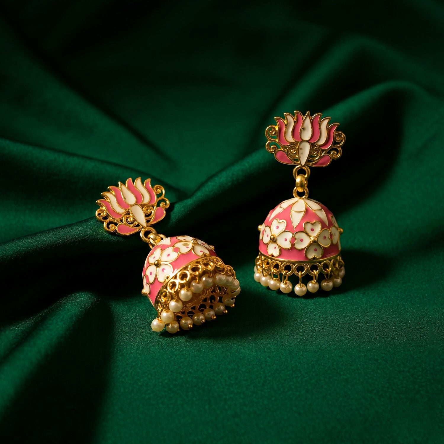 Pink lotus jhumka earrings showcasing intricate floral design