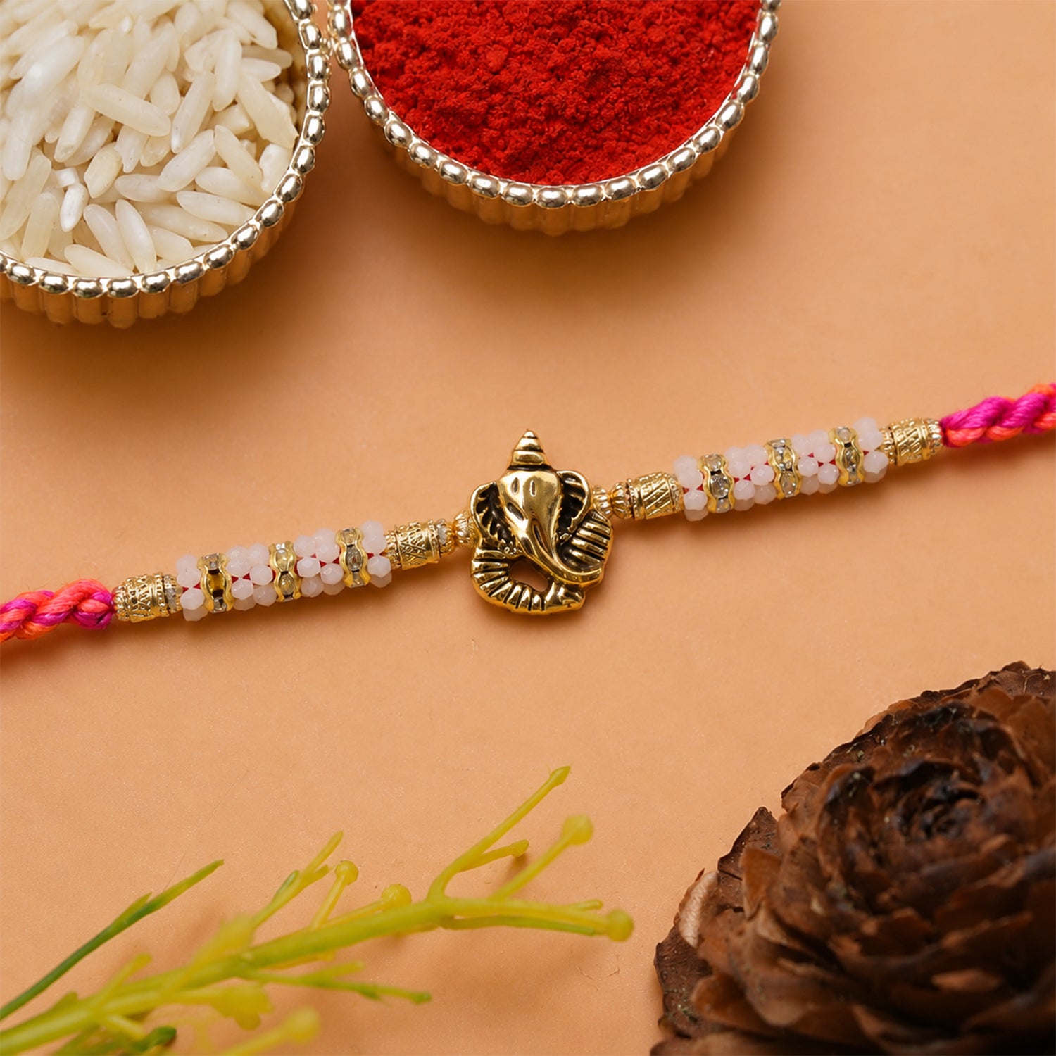Silver Tone Designer Rakhi with Pastel Beads and Elegant Bracelet Style Finish