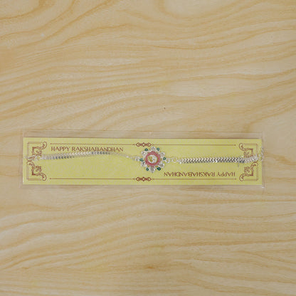 The Om Rakhi presented on a neutral background, ready for gifting during Raksha Bandhan.