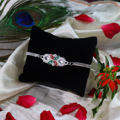 Elegant Floral Rakhi with Red-Green Enamel Work and Metal Chain