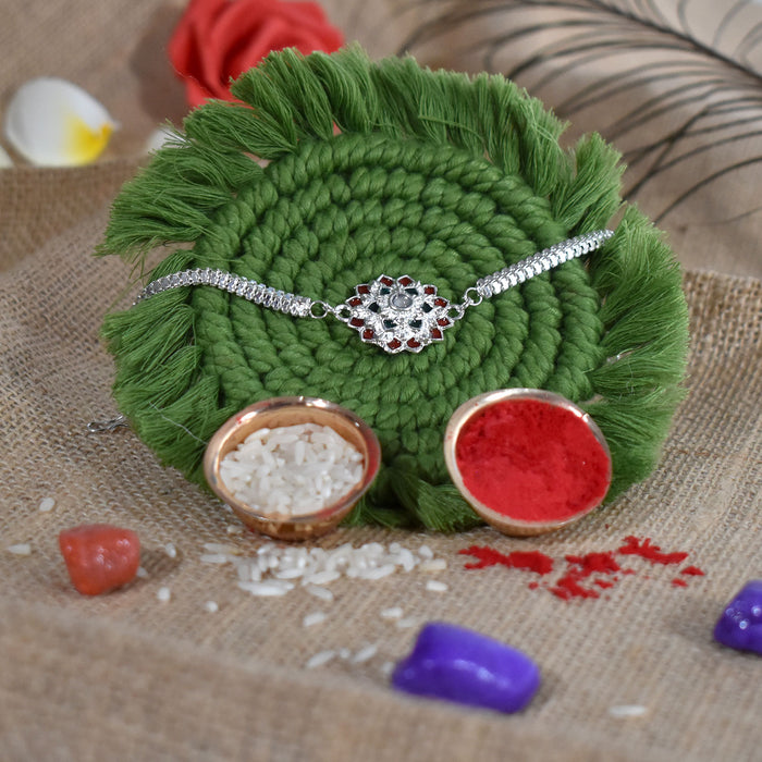 Flower Rakhi Combo with Effete Choco Magic 32gm, Silver Color Pooja Coin, Roli Chawal & Greeting Card