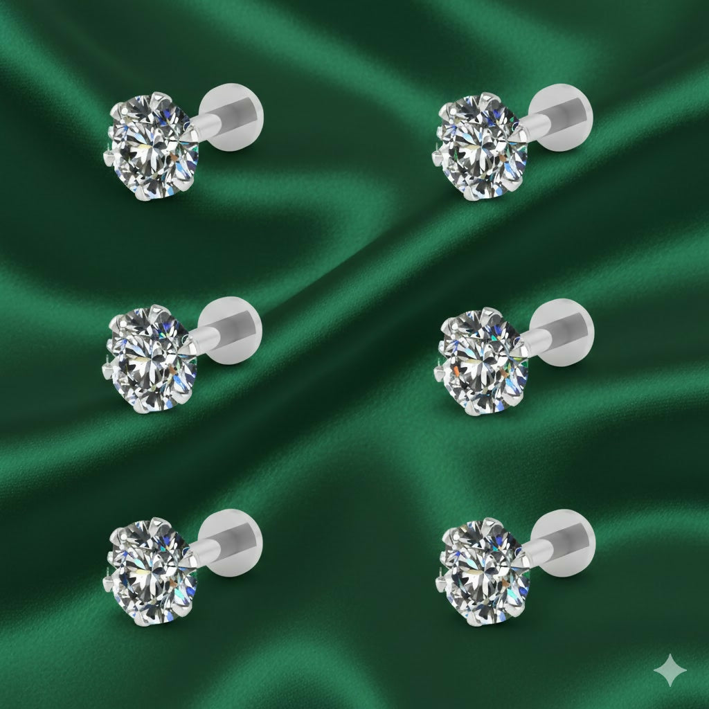 Close-up of silver plated round cubic zirconia stud earrings showing sparkly CZ stone