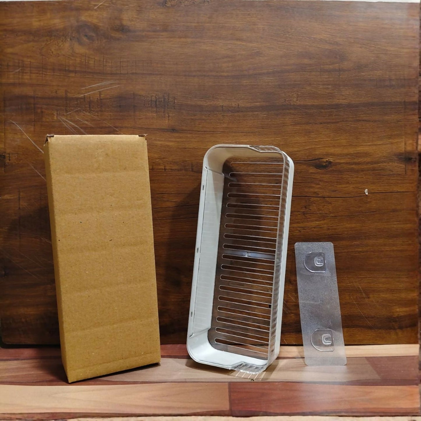 Kitchen spices and bottles stored on wall rack