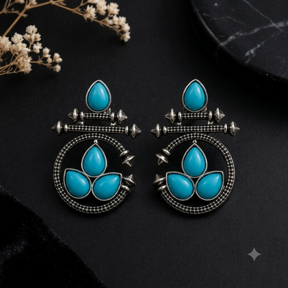 Side view of vintage style tribal earrings