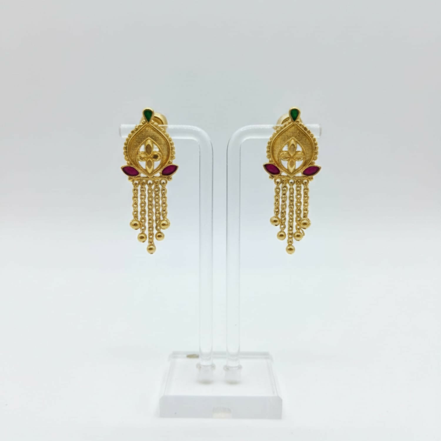 Side view of elegant lightweight gold-plated jhumka earrings with delicate golden beads