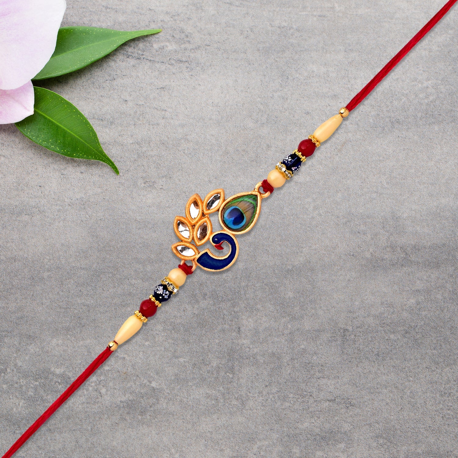 Handcrafted Mor Pankh Rakhi with attention to detail
