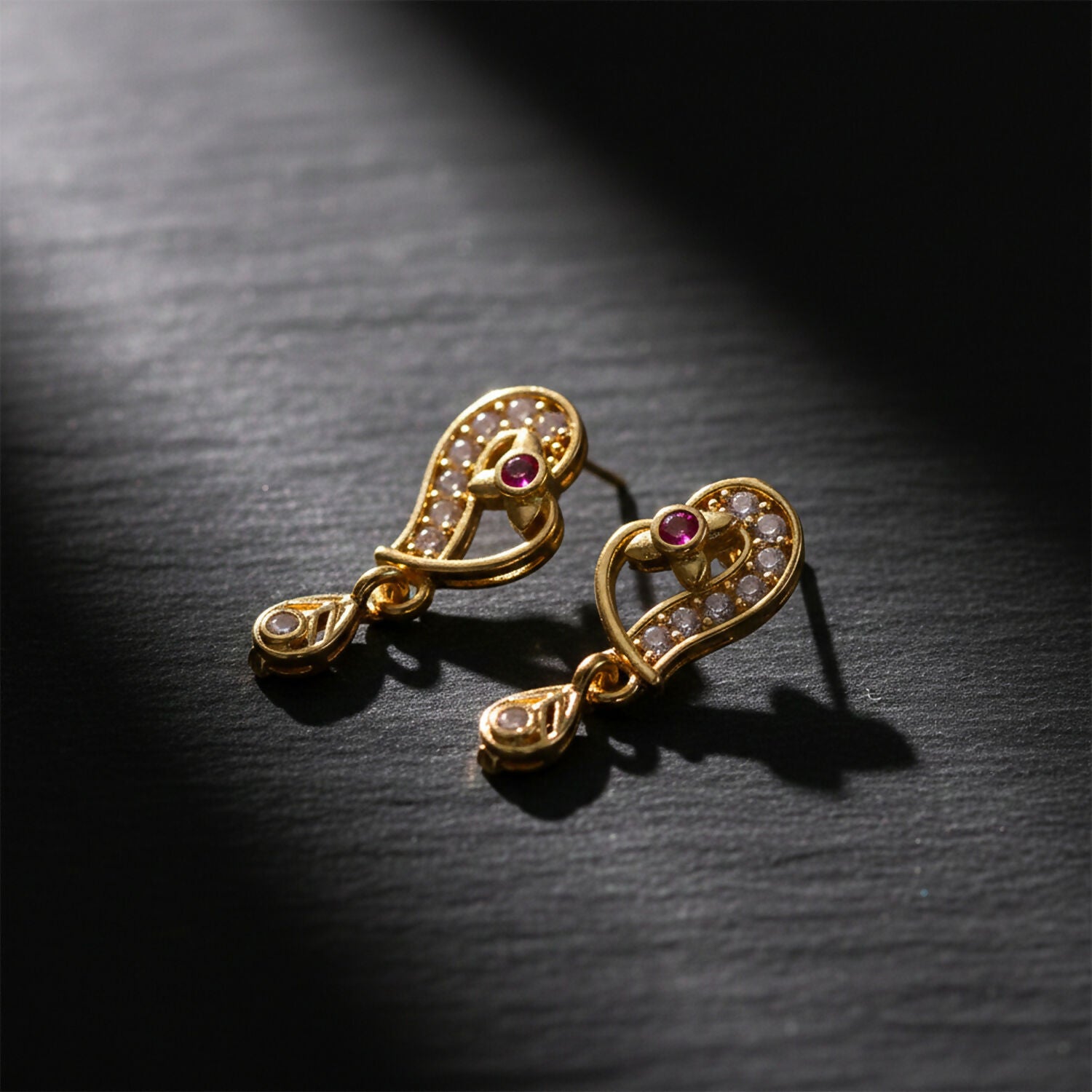 Elegant Gold Paisley Drop Earrings with Ruby Accent