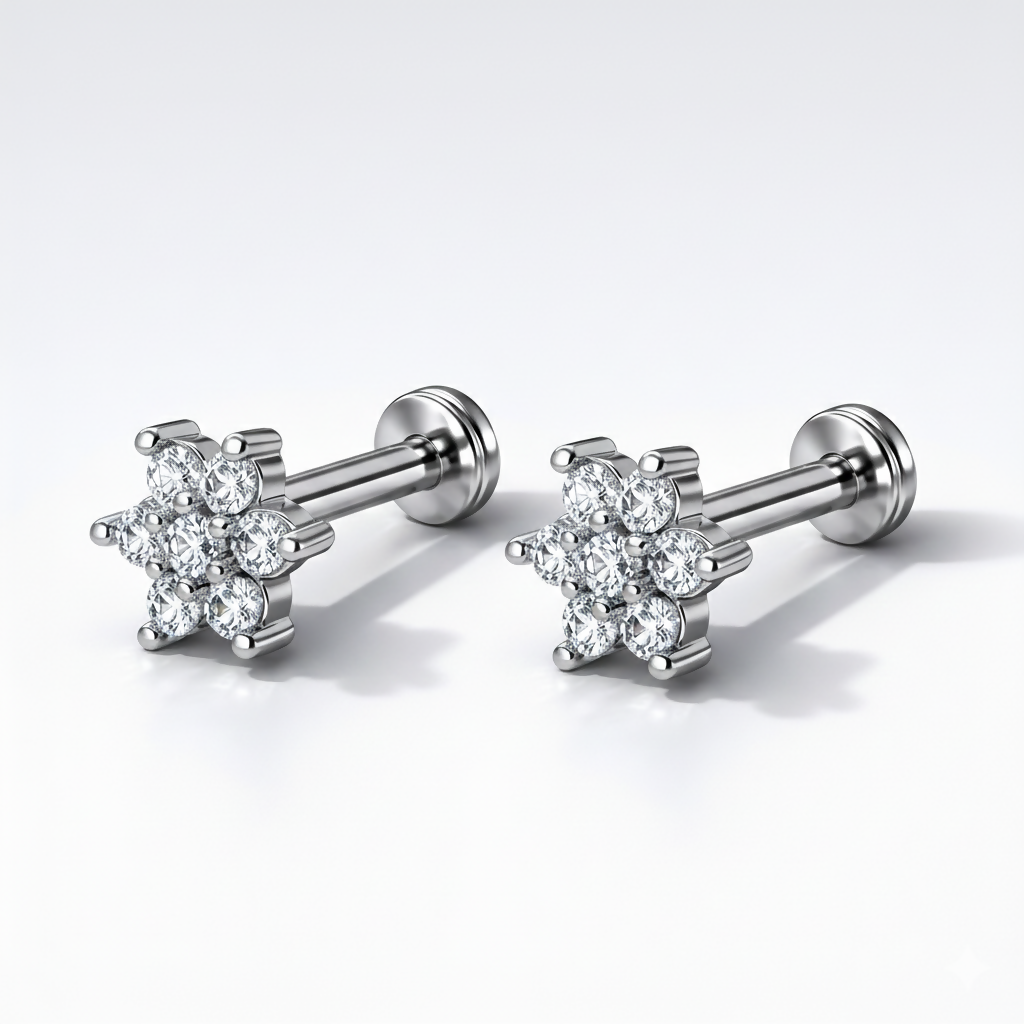 Pair of silver plated crystal flower flat back nosepin studs displayed side by side