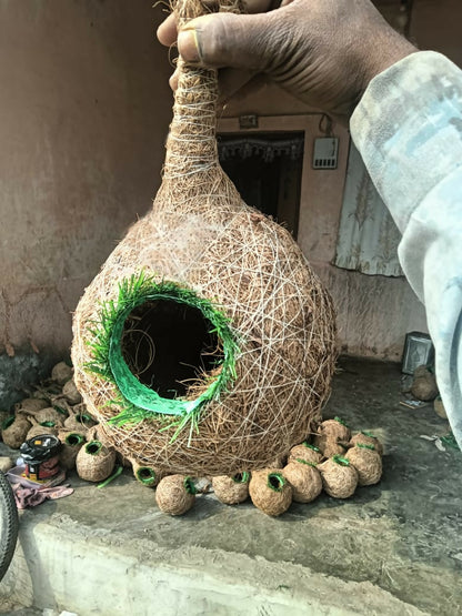 Eco-friendly bird nest suspended outdoors in garden