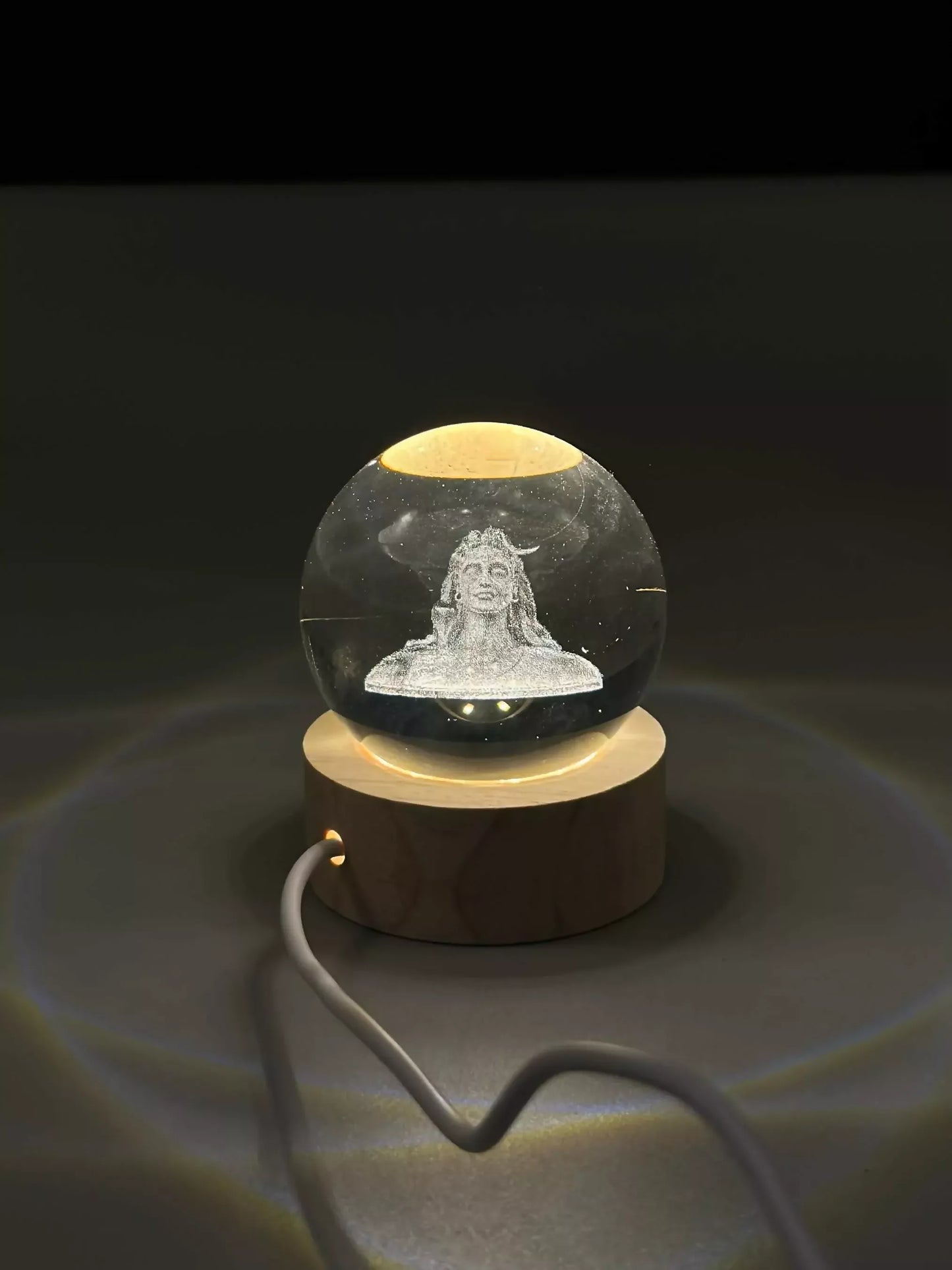 Adiyogi Shiva crystal ball night lamp lit with warm LED light