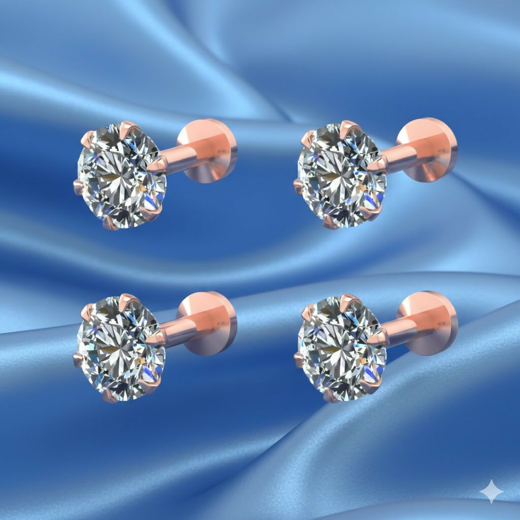 Close-up of rose gold plated flat back diamond stud earrings for women