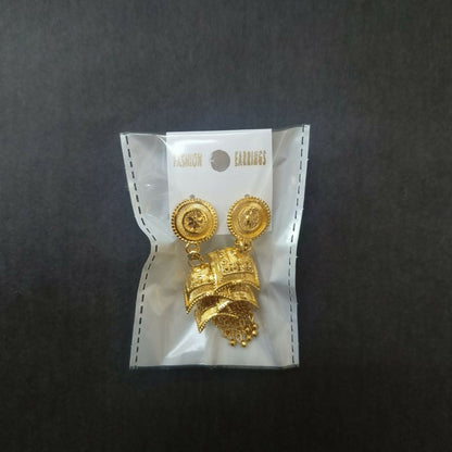 Gold plated ethnic jhumki earrings on display