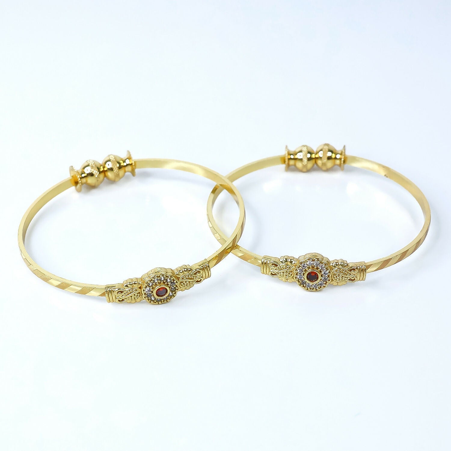 Pair of floral bangles showcasing detailed beadwork