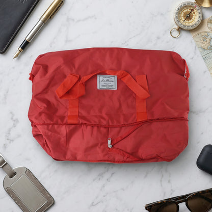 Red travel carry bag exterior detail