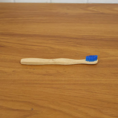 Wooden toothbrush in natural setting
