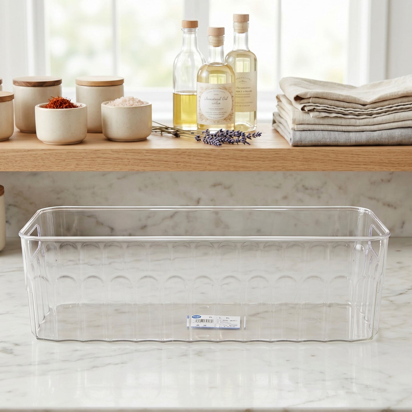 Cleanable transparent basket ideal for sorting grocery items.