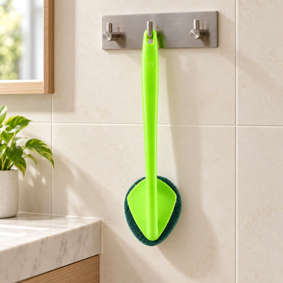 Detailed view of scrubber hockey with long handle.