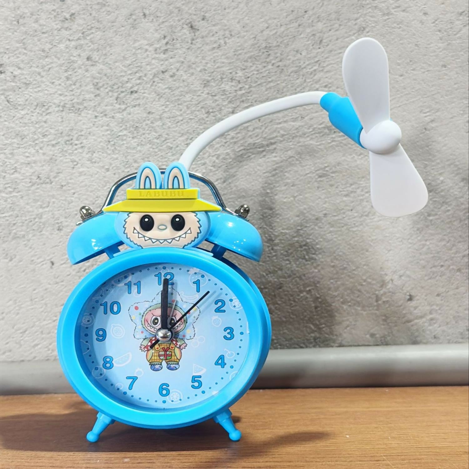 Cute Cartoon Character Alarm Clock with Cooling Fan | Dual Bell Retro Kids Table Clock | Loud Alarm, Battery Operated, Decorative Bedside Clock for Study, Bedroom & Gifts – Blue