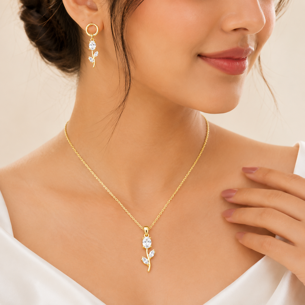 Model wearing the white crystal floral pendant necklace set, highlighting its refined look.