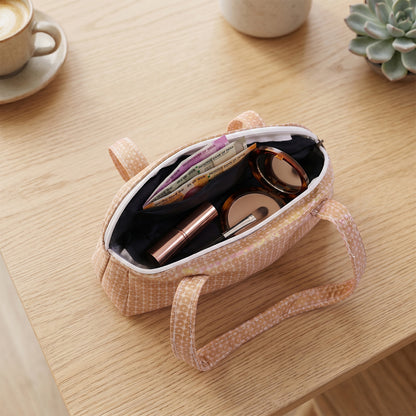 Stylish small handbag with printed faux-leather finish