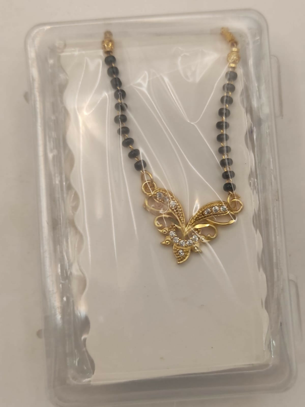 Gold-Plated Floral Butterfly Mangalsutra with Black Beads